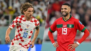 Luka Modrić of Croatia and Youssef En-Nesyri of Morocco at World Cup 2022 in Qatar