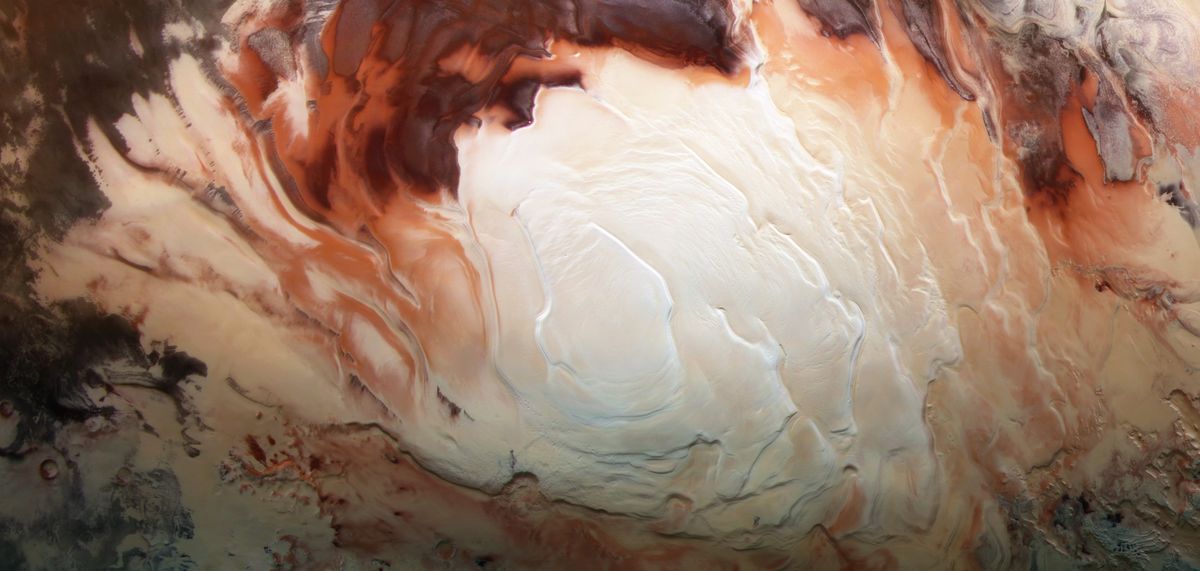 The bright white region of this image, captured by Europe&#039;s Mars Express spacecraft in December 2012, shows the icy cap that covers Mars’ south pole, composed of frozen water and frozen carbon dioxide.