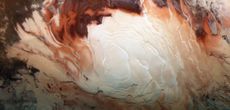 The bright white region of this image, captured by Europe's Mars Express spacecraft in December 2012, shows the icy cap that covers Mars&rsquo; south pole, composed of frozen water and frozen carbon dioxide.