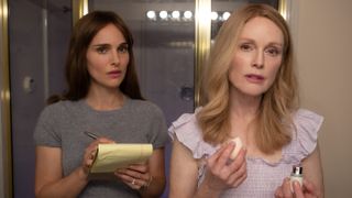 Natalie Portman and Julianne Moore stand next to each other in May December