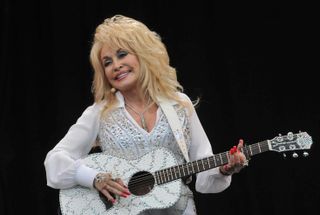 Dolly Parton performs on the Pyramid stage during day three of the Glastonbury Festival at Worthy Farm