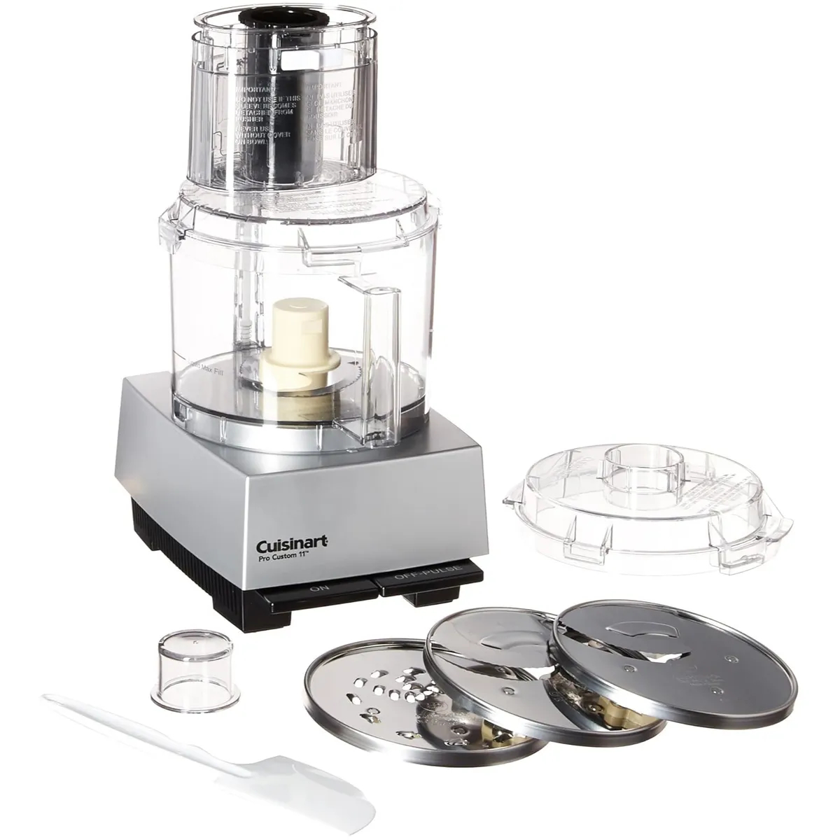 Food processor with attachments on white background
