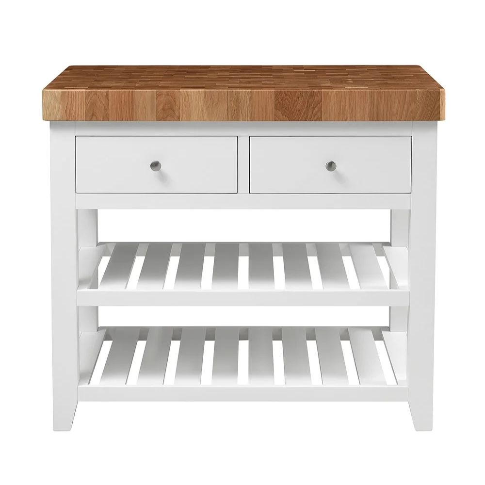 A white solid wood butchers block kitchen island