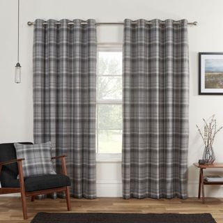 A fully lined modern tartan check blackout curtain