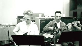 Carol Kaye and Bill Pittman playing guitar in a Los Angeles recording studio, early 1960's.