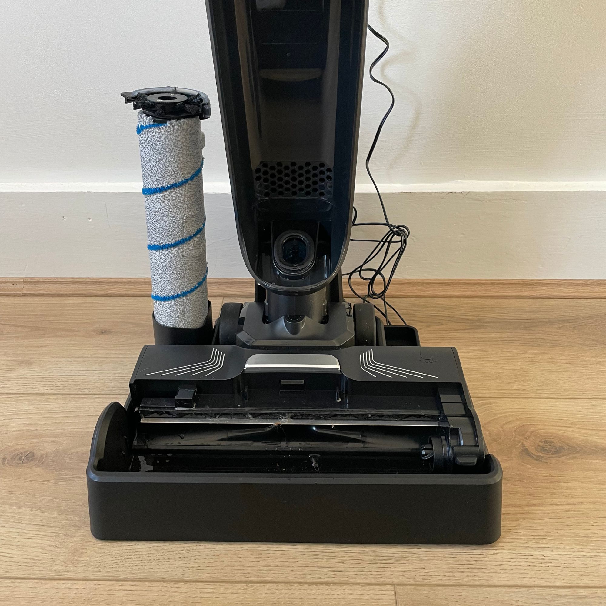 Tefal X-CLEAN 4 vacuum mop on its stand