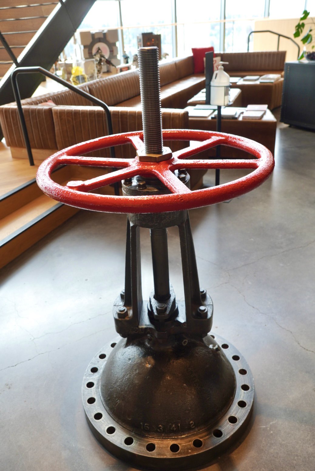 Hideo Kojima poses with various objects at Valve Software's offices.