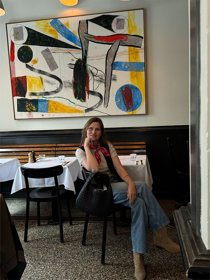 Eugenie Trochu wearing a silk scarf.