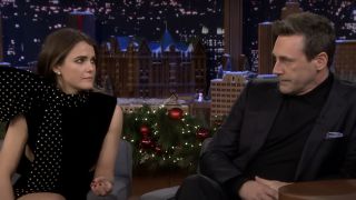 Jon Hamm enviously glaring at Keri Russell, in jest, on The Tonight Show