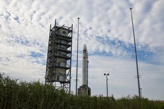 A Northrop Grumman Minotaur IV rocket carrying NROL-129, four classified payloads for the U.S. National Reconnaissance Office, stands atop Pad-0B of NASA's Wallops Flight Facility ahead of a July 15, 2020 launch.