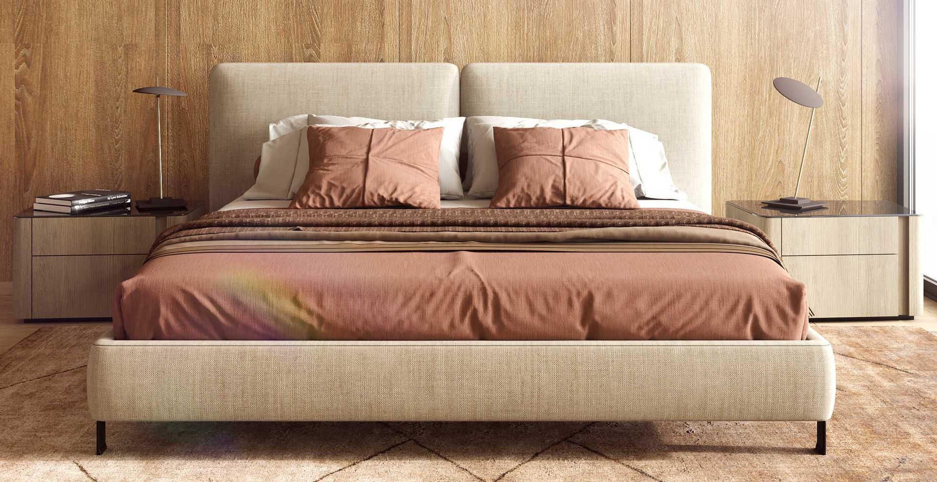 Japandi bedroom with wooden walls and beige upholstered bed with rust colored bedding on a subtle patterned rug