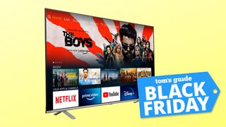 Toshiba 65-inch 3K UHD TV on a yellow background. A label reads "Tom's Guide Black Friday"