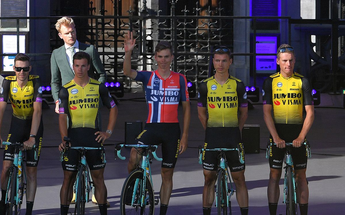 Amund Jansen opts for a block Norwegian flag on his jersey with black shorts