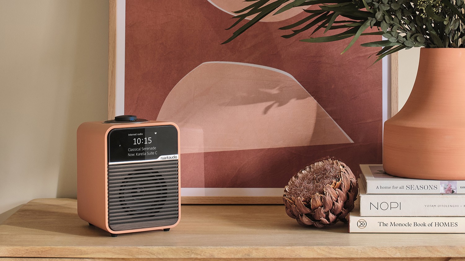 Ruark R1S Terracotta special edition radio on a shelf in a living room