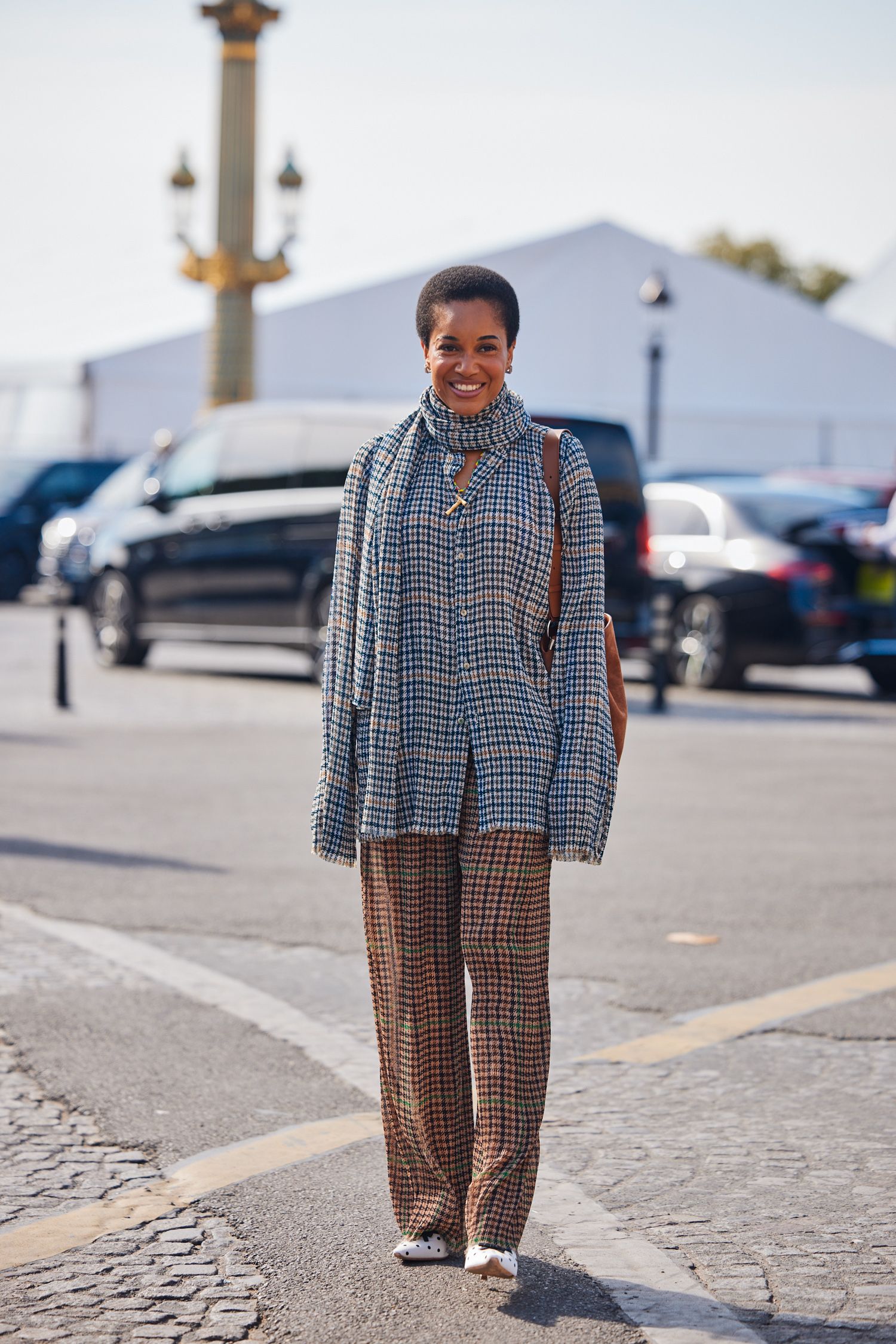 A Paris Fashion Week attendee shows off their outfit.