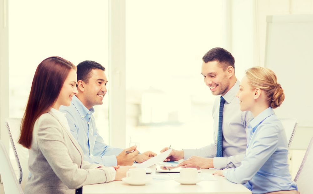 Colleagues collaborating around a table