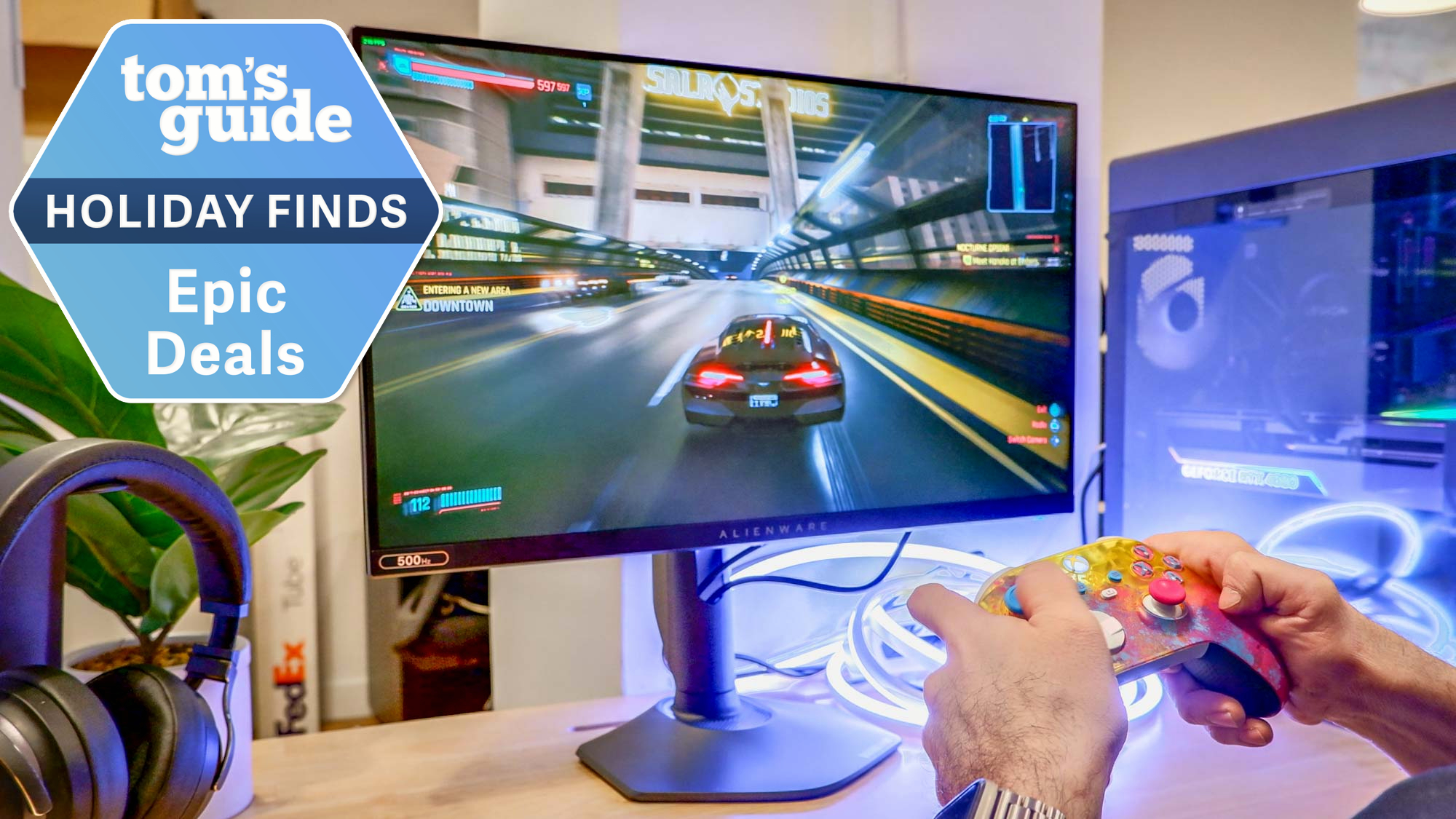 Alienware gaming monitor with Tom's Guide Epic Deals tag superimposed