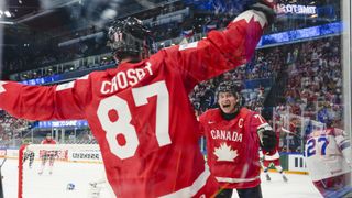Canada's Sidney Crosby and Macklin Celebrini celebrating at the 2026 IIHF World Championship