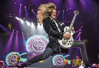Joel Hoekstra plays his Gibson Custom Shop Les Paul, which has a gold-plated Whitesnake medallion set into the body
