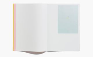 White empty book pages with grey rectangle
