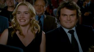 Iris (Kate Winslet) and Amanda (Jack Black) take in a show in The Holiday