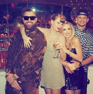 Travis Kelce and Taylor Swift ringing in 2024 at a New Year's Eve party in Kansas City.