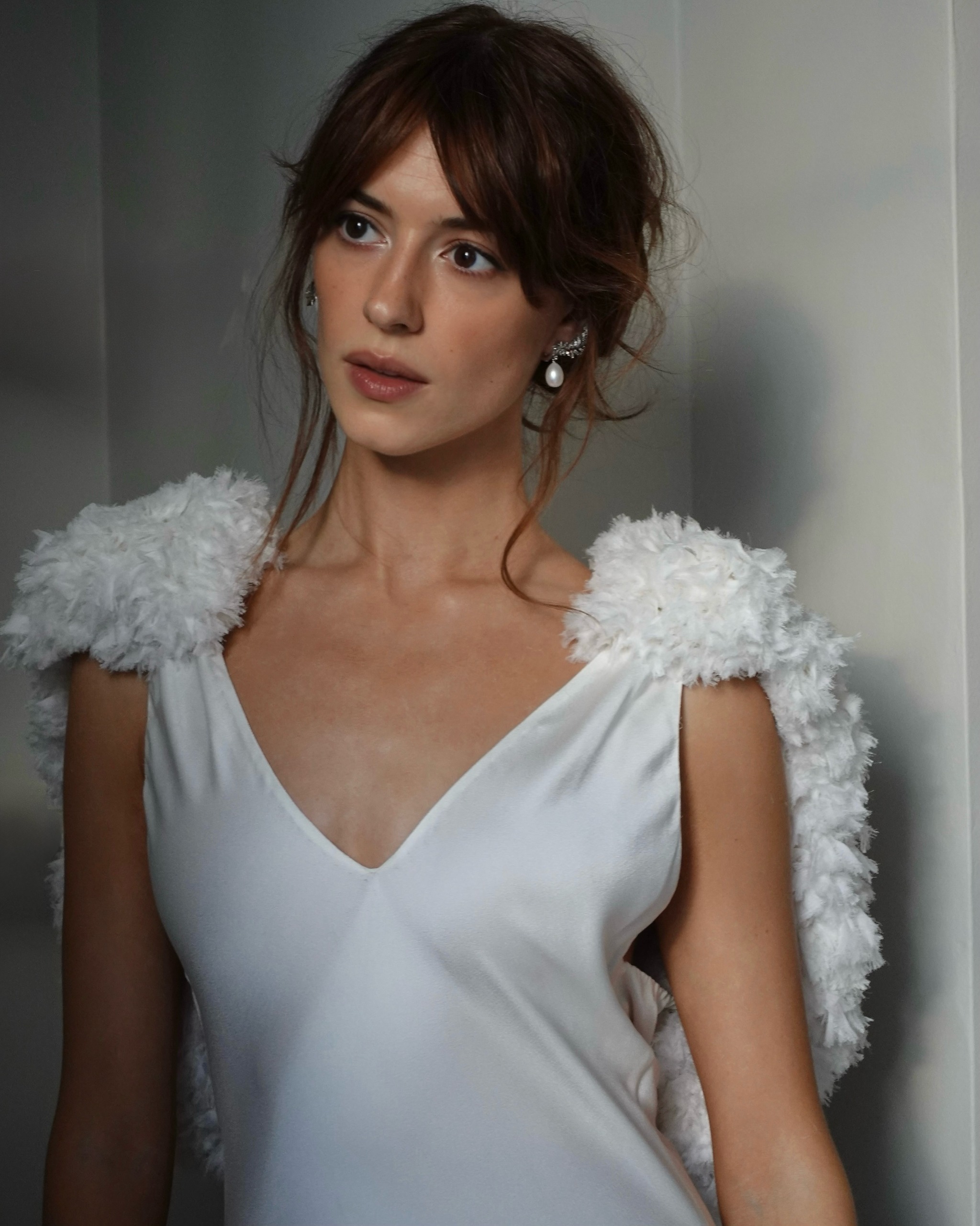 Daisy Edgar-Jones with layered hair and curtain fringe