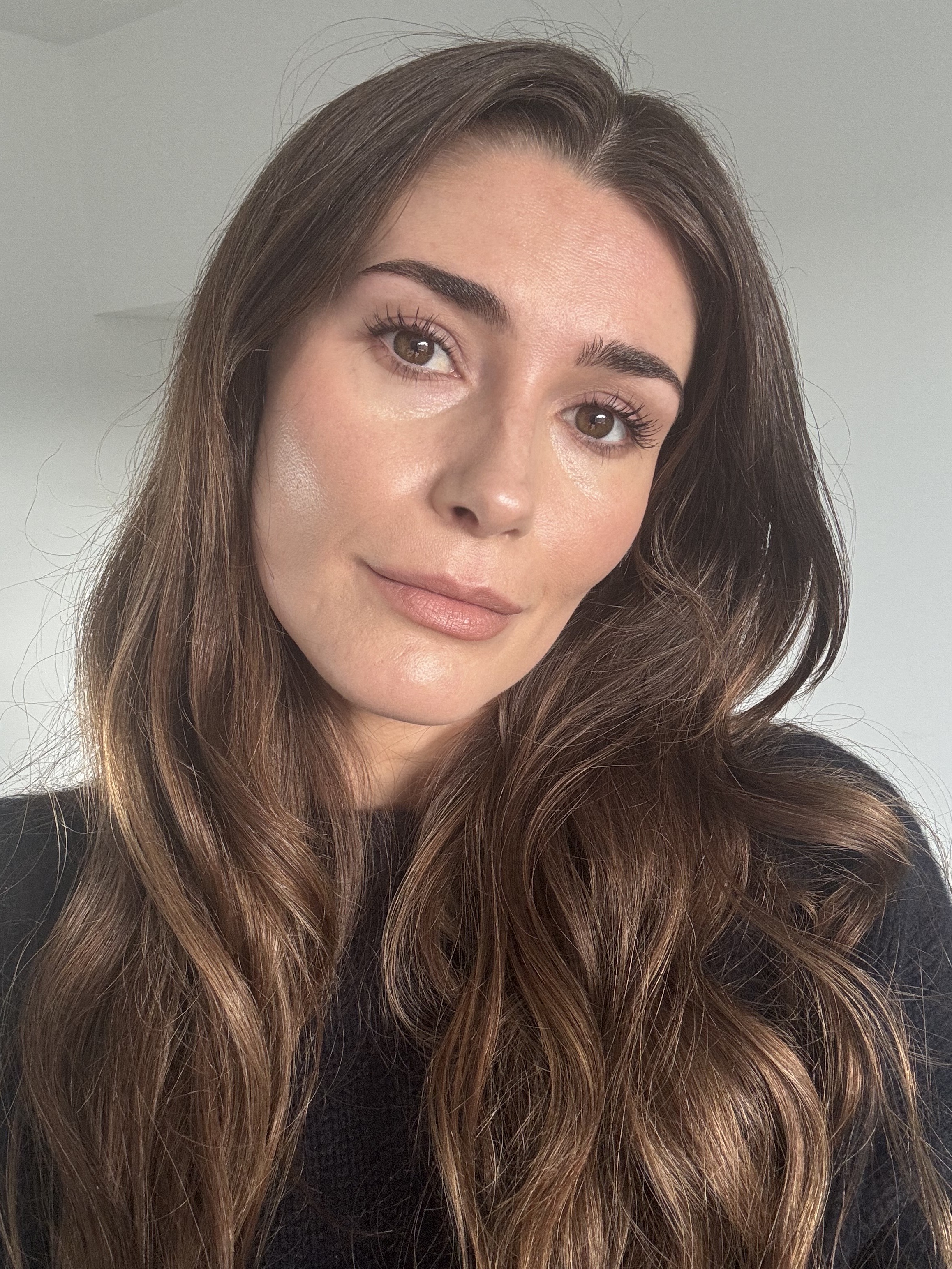 A selfie of Eleanor Vousden after using the garnier vitamin c sorbet moisturiser with her makeup applied on top