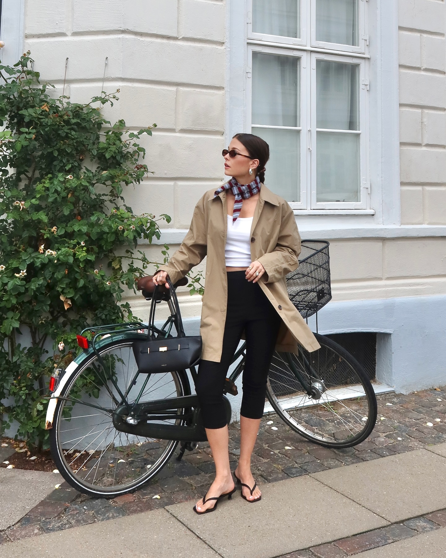 the alice edit wears a blazer, capri pants and flip flops with a neckerchief