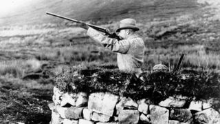 King George V (1865 - 1936) enjoys some shooting at Balmoral, beside the River Dee in Aberdeenshire.(Photo by Hulton Archive/Getty Images)