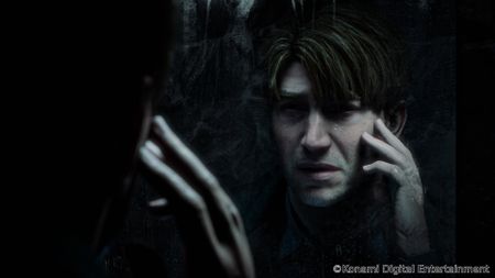 Silent Hill 2 Remake screenshot of James Sunderland examining his face in the mirror