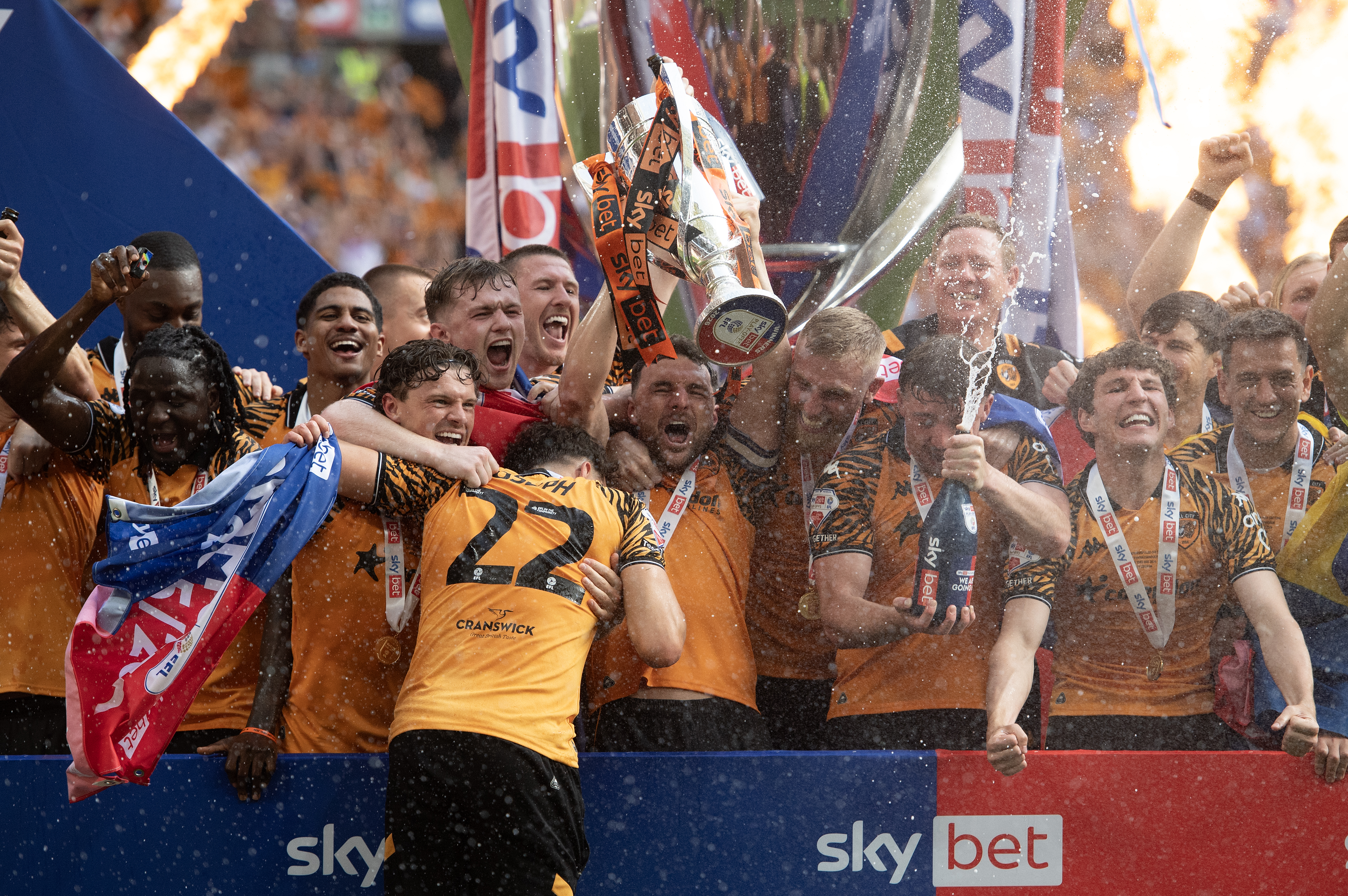 LONDON, ENGLAND - MAY 23: Lewis Coyle of Hull City lifts the Sky Bet Championship Play Off Final trophy after being promoted to the Premier League after the Hull City v Middlesbrough - Sky Bet Championship Final at Wembley Stadium on May 23, 2026 in London, England. (Photo by Visionhaus/Getty Images)