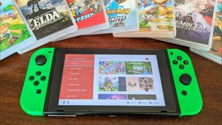 Nintendo Switch next to Switch boxes