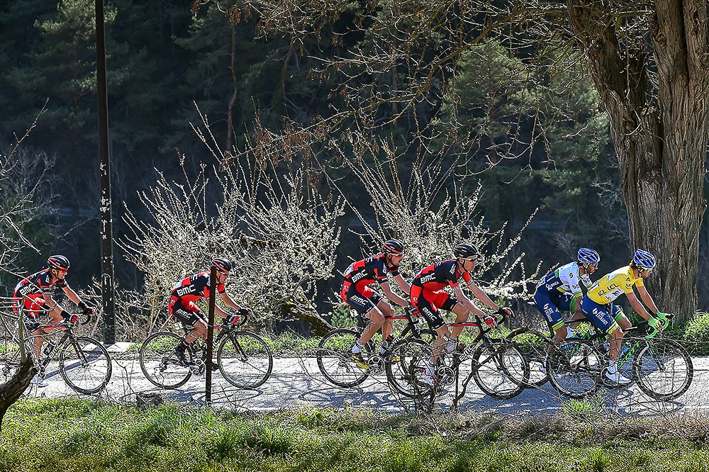 The peloton rides through the French countryside during stage 6 at Paris-Nice.