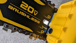 DeWalt DCCS623B 20V MAX 8 in. Brushless Cordless Battery Powered Pruning Chainsaw being tested in writer's home