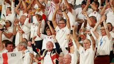England fans celebrate a try at the Rugby World Cup in Japan 