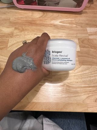 Ariel Baker showing the Texture of the Briogeo Scalp Scrub