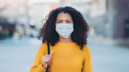 woman wearing face mask in the street