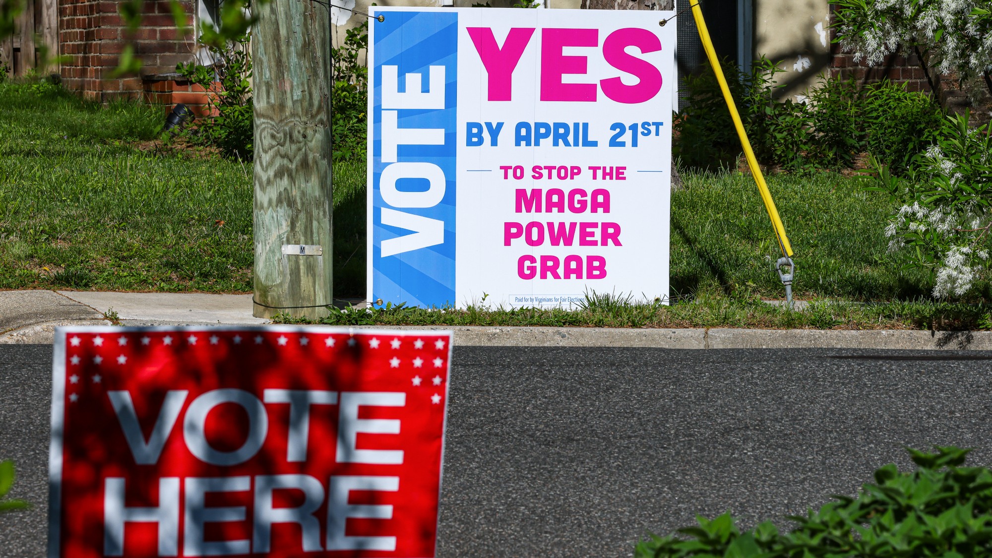 A sign encouraging voters to vote yes on Virginia's redistricting map