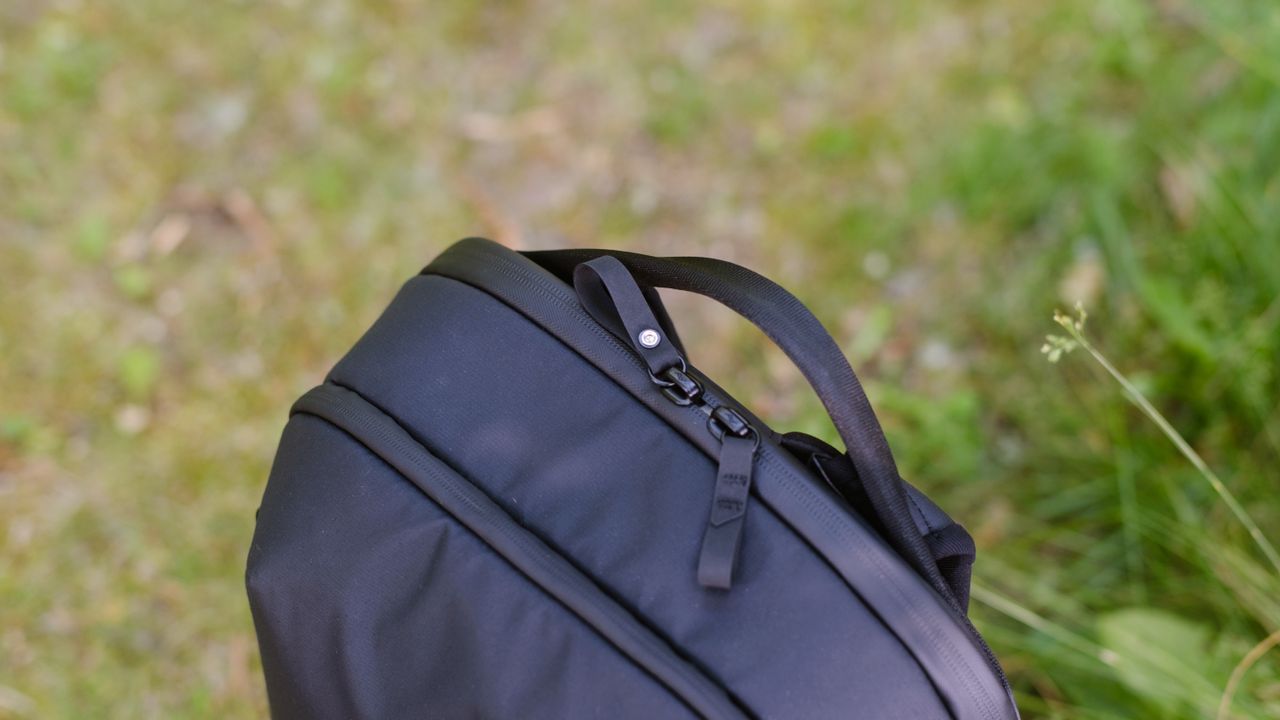 The Peak Design Travel Backpack 20L in use by a photographer