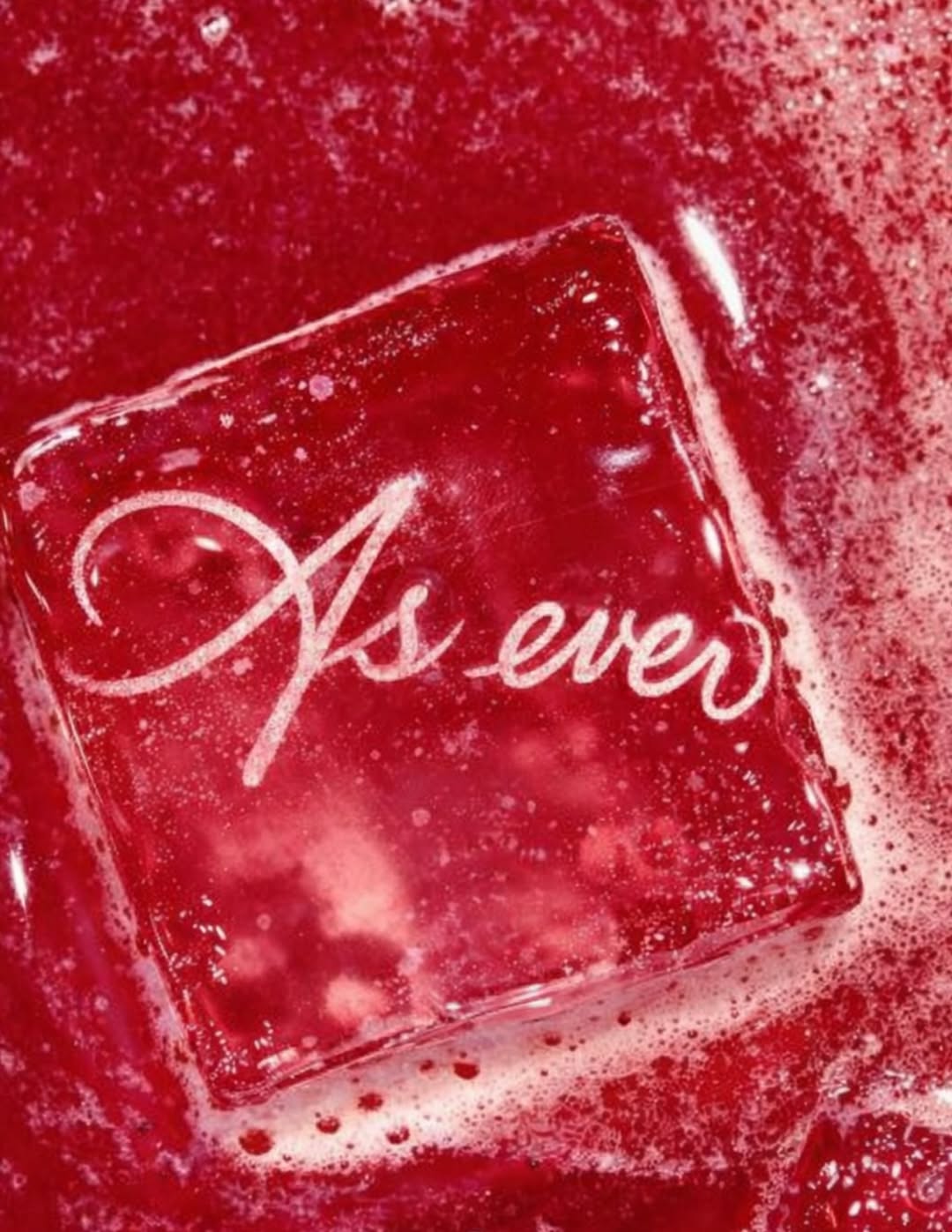 Meghan Markle wears a deep red burgundy dress with black straps and offers her take on the celeb-beloved slip dress trend in Heidi Merrick