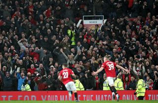 Scott McTominay celebrates scoring Manchester United’s second against Manchester City in March