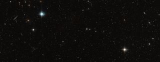 An image of the Draco dwarf galaxy created from images taken by Hubble over 18 years