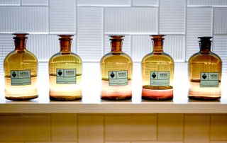 Amber glass bottles of Mo61 cologne