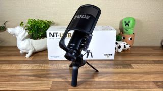 Rode NT-USB+ microphone mounted on the included desk stand
