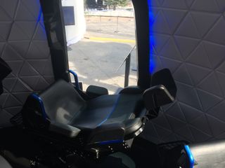 One of six passenger seats in the interior of a mockup of the New Shepard human spaceflight capsule.