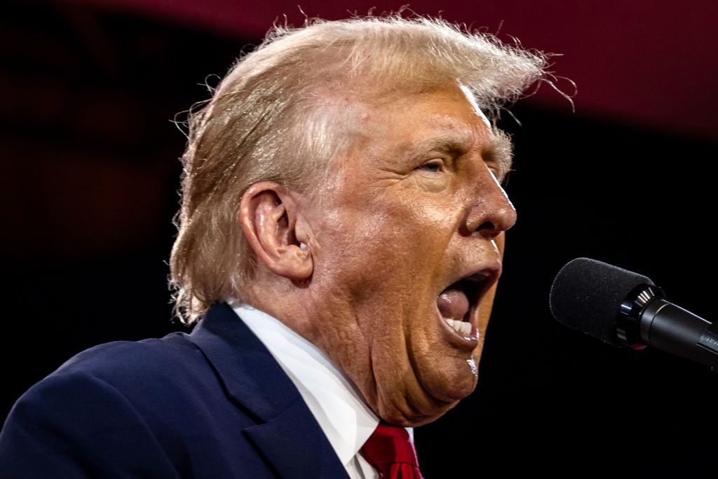 Former U.S. President Donald Trump speaks at a conference at the Washington Hilton 