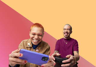 Image of gamers, one using a mobile phone and the other a PlayStation controller