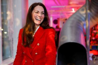 Catherine, Duchess of Cambridge reacts during a visit to the LEGO Foundation PlayLab on February 22, 2022
