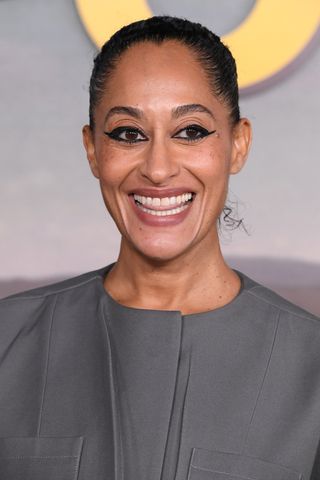 Tracee Ellis Ross, with a slicked back hair look, arrives at the Los Angeles Premiere For Peacock Original Series "Poker Face" at Hollywood Legion Theater on January 17, 2023 in Los Angeles, California.